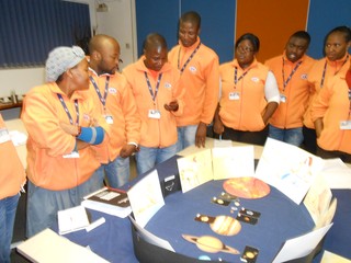 Science Centre trainers playing the planet game