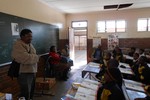 Professor Thebe Medupe addressing learners at a school in Mafikeng